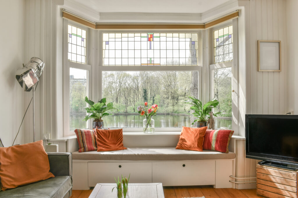 Cozy spacious and bright dining area with a wonderful view from a large window